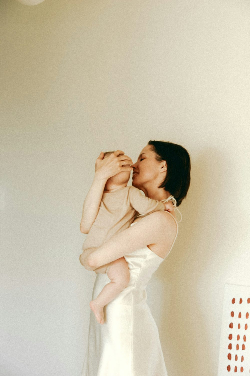 A mother holding her baby